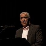 Sim Gill, Salt Lake County district attorney, reading from 'Anne Frank: The Diary of a Young Girl.' Photo by Rick Pollock.