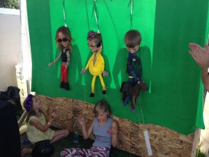 Moving and dancing puppets to music from karaoke pop to classic rock, Urban Arts visitors at the Utah Arts Festival enjoy Spy Hop's 'human puppets.'