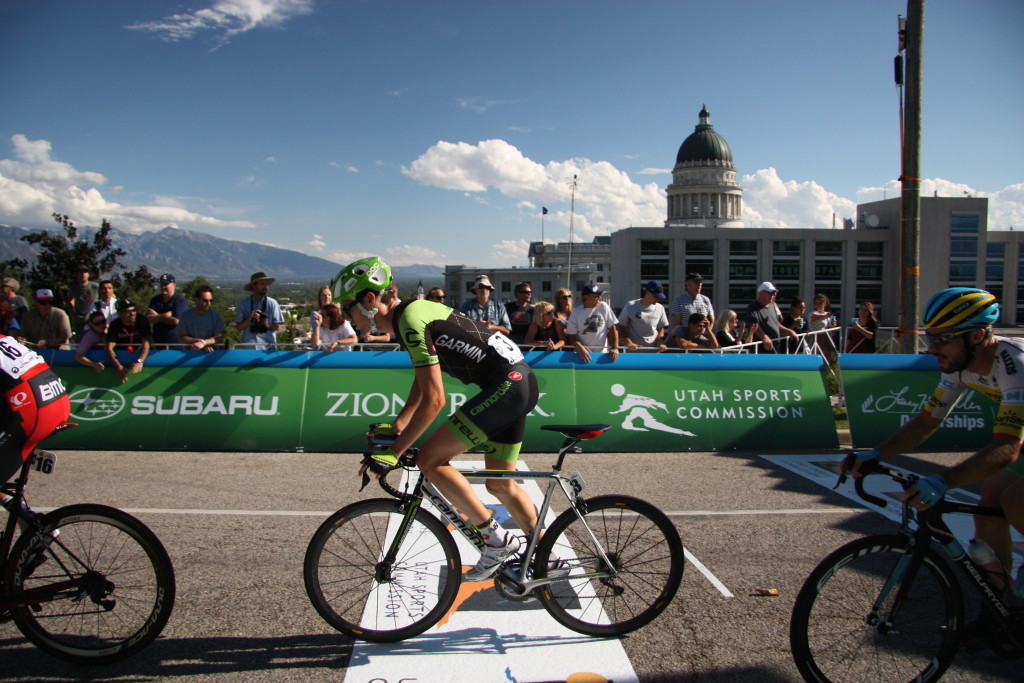 Alex Howes, with Cannondale Garmin, races past the Capitol building